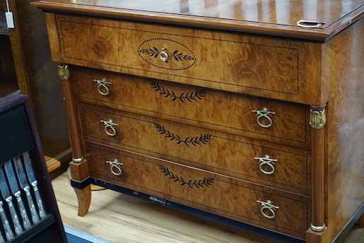 A Biedermier style bird's eye maple commode, width 124cm, depth 54cm, height 96cm